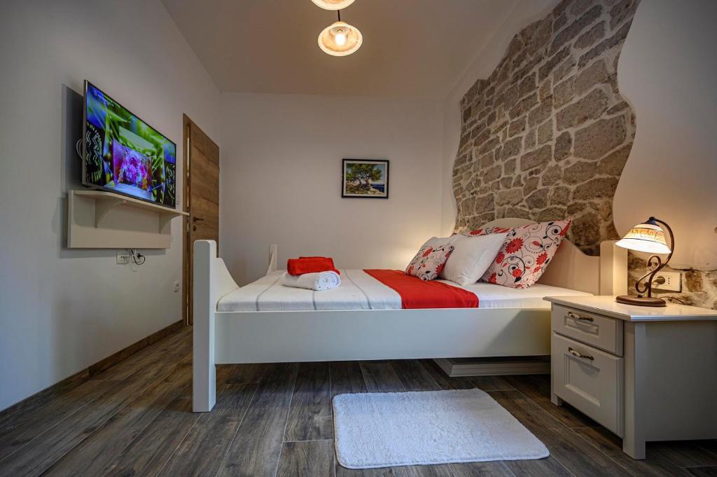 Postel nebo postele na pokoji v ubytování Villa Dajana