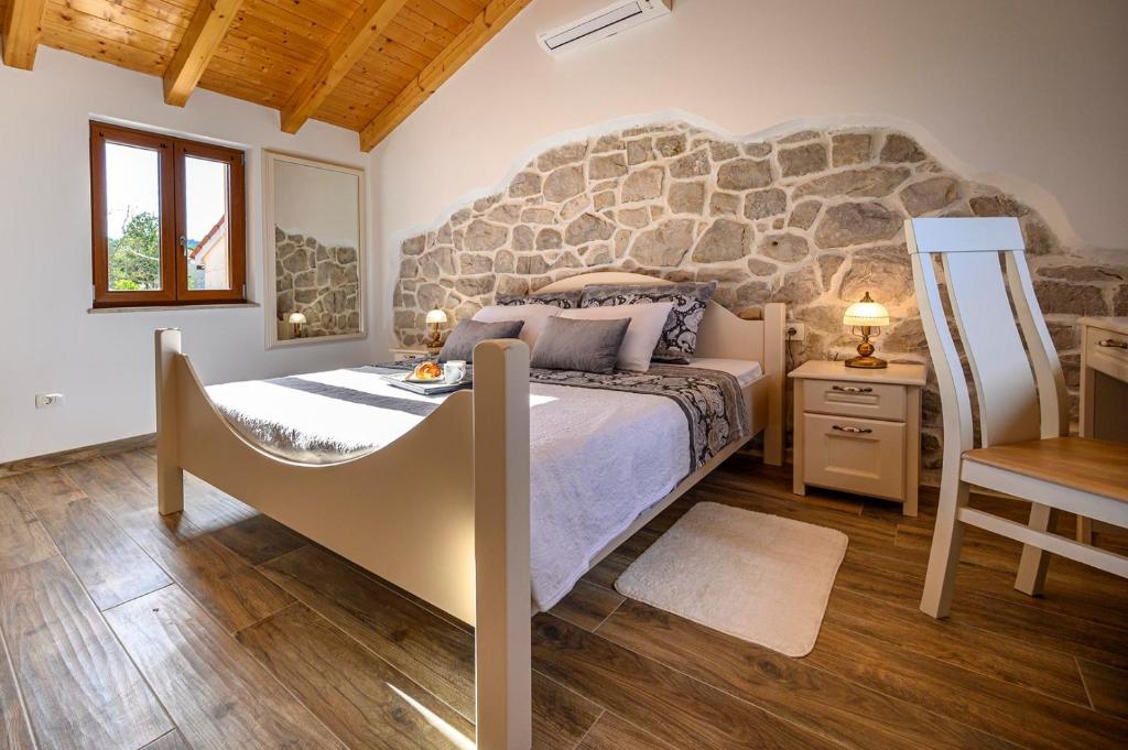 Postel nebo postele na pokoji v ubytování Villa Dajana