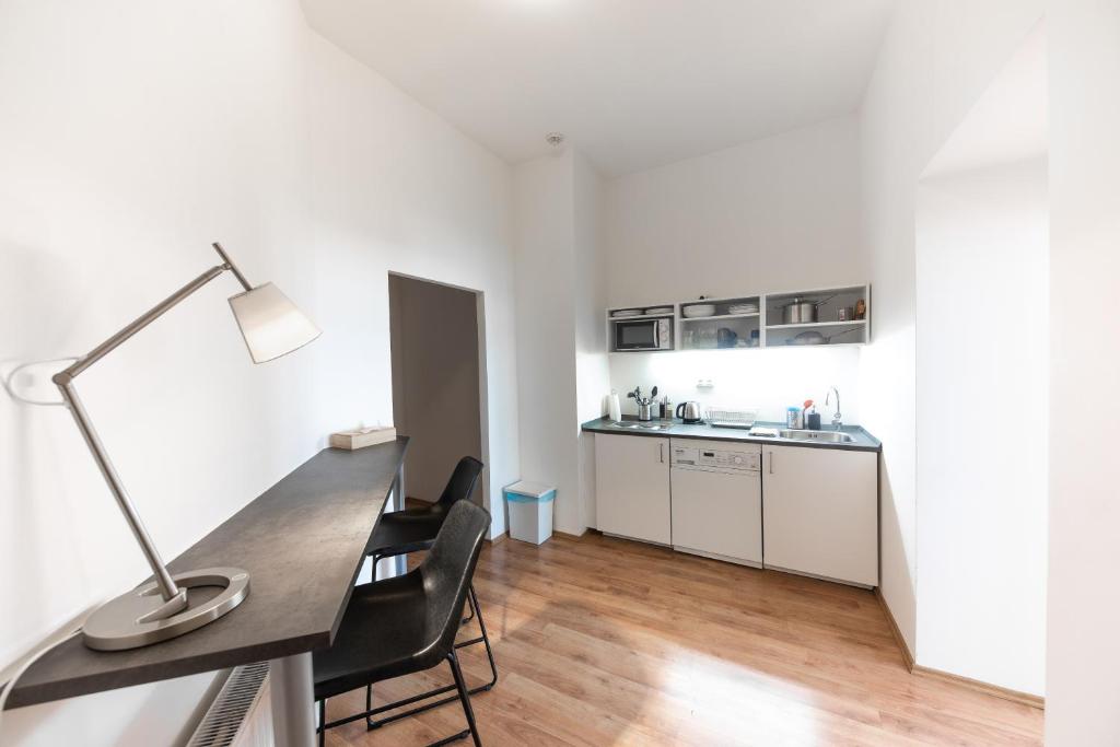 Kuchyňa alebo kuchynka v ubytovaní Jacob Brno Apartments