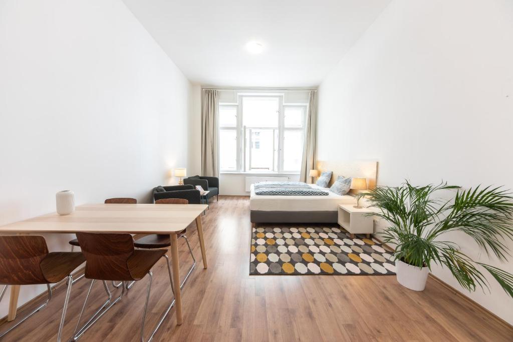 Posteľ alebo postele v izbe v ubytovaní Jacob Brno Apartments