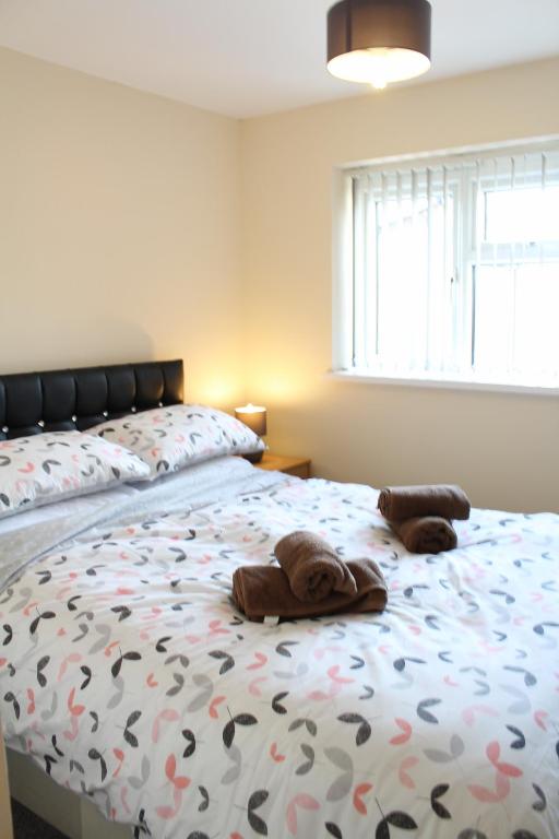 Postel nebo postele na pokoji v ubytování Van Apartments