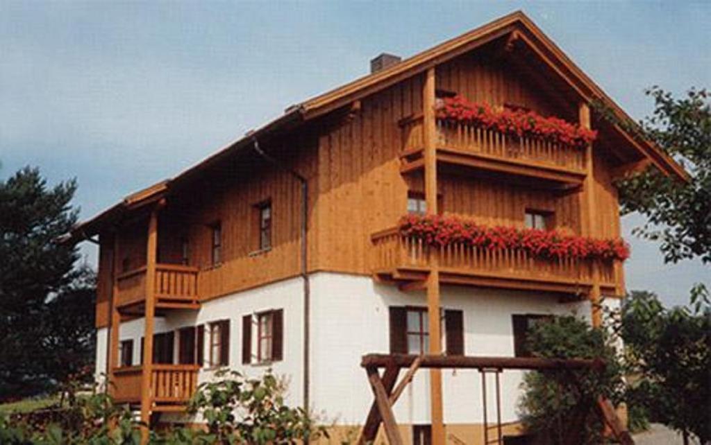 a large house with balconies on the side of it at Ferienwohnungen Krieger in Mauth
