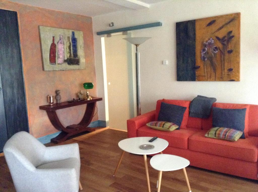 A seating area at Appartement Monseigneur