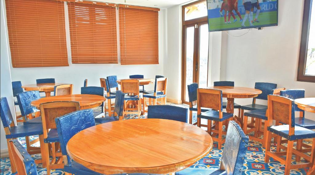 Un restaurante u otro lugar para comer en Hotel Presidente Las Tablas