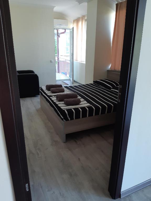 Postel nebo postele na pokoji v ubytování Ureki GuestHouse