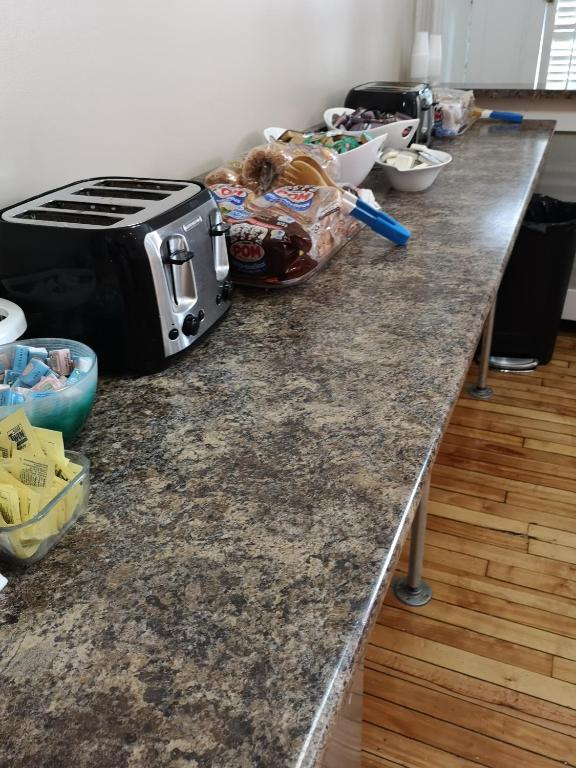 Kuchyň nebo kuchyňský kout v ubytování Hotel Abri du Voyageur