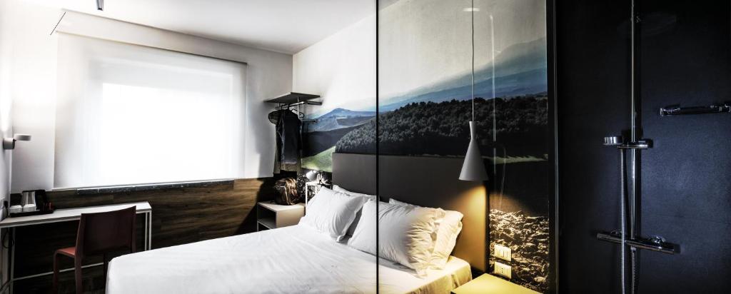Postel nebo postele na pokoji v ubytování Best Western Hotel Corsi