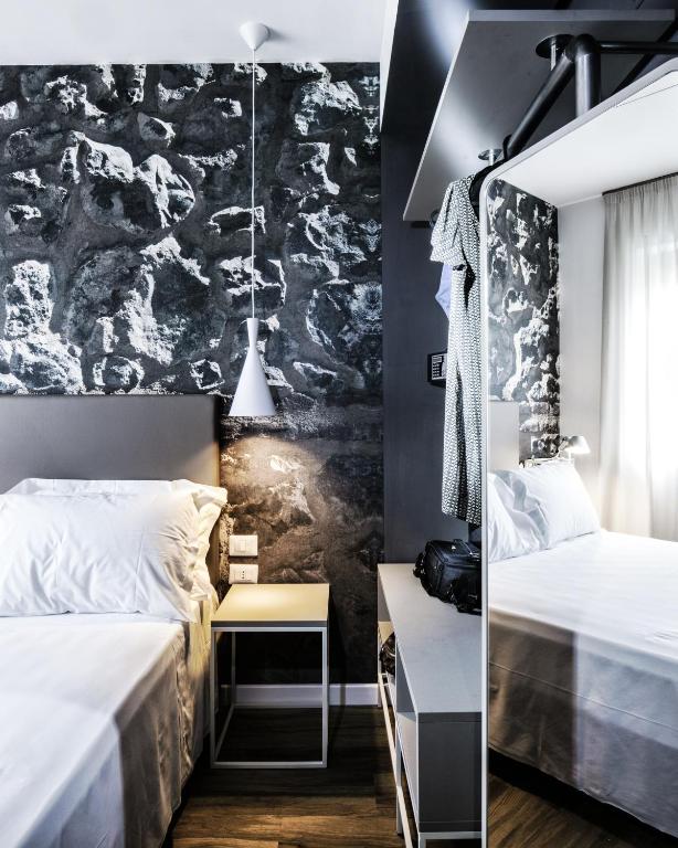 Postel nebo postele na pokoji v ubytování Best Western Hotel Corsi