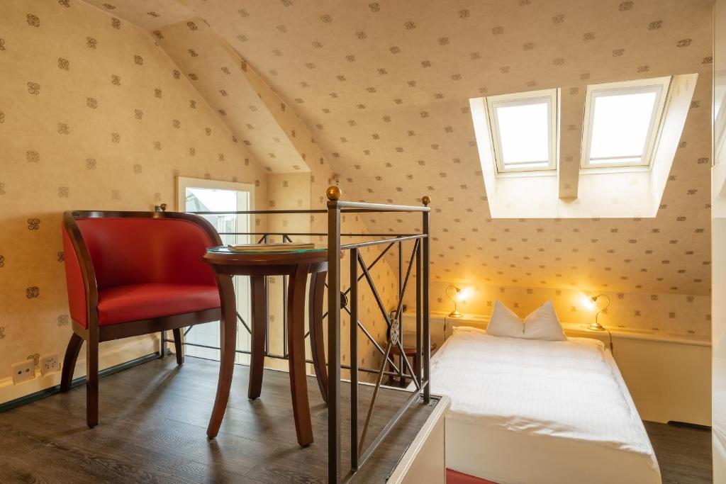 Postel nebo postele na pokoji v ubytování Boutique Hotel Belle Epoque