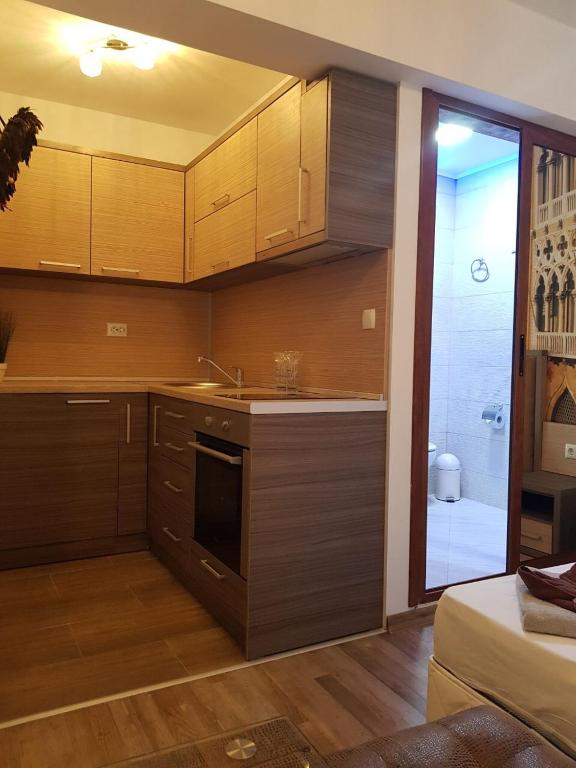 Kuchyň nebo kuchyňský kout v ubytování Lombardi Family Hotel