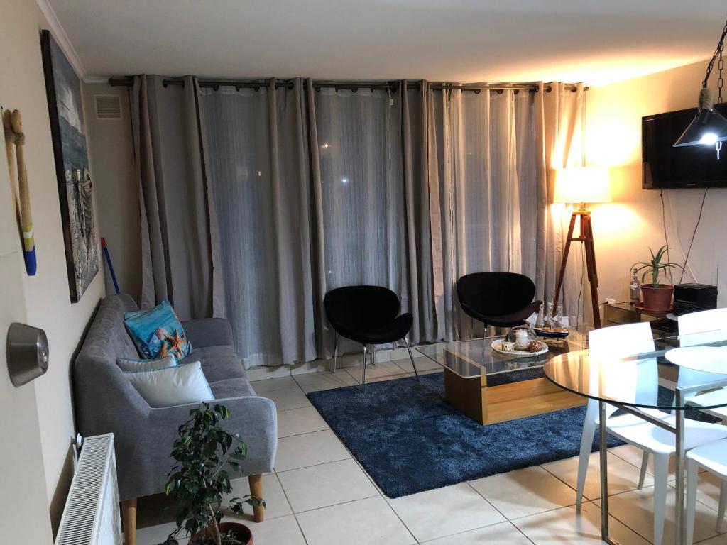 TV a/nebo společenská místnost v ubytování Vista Laguna Apartment