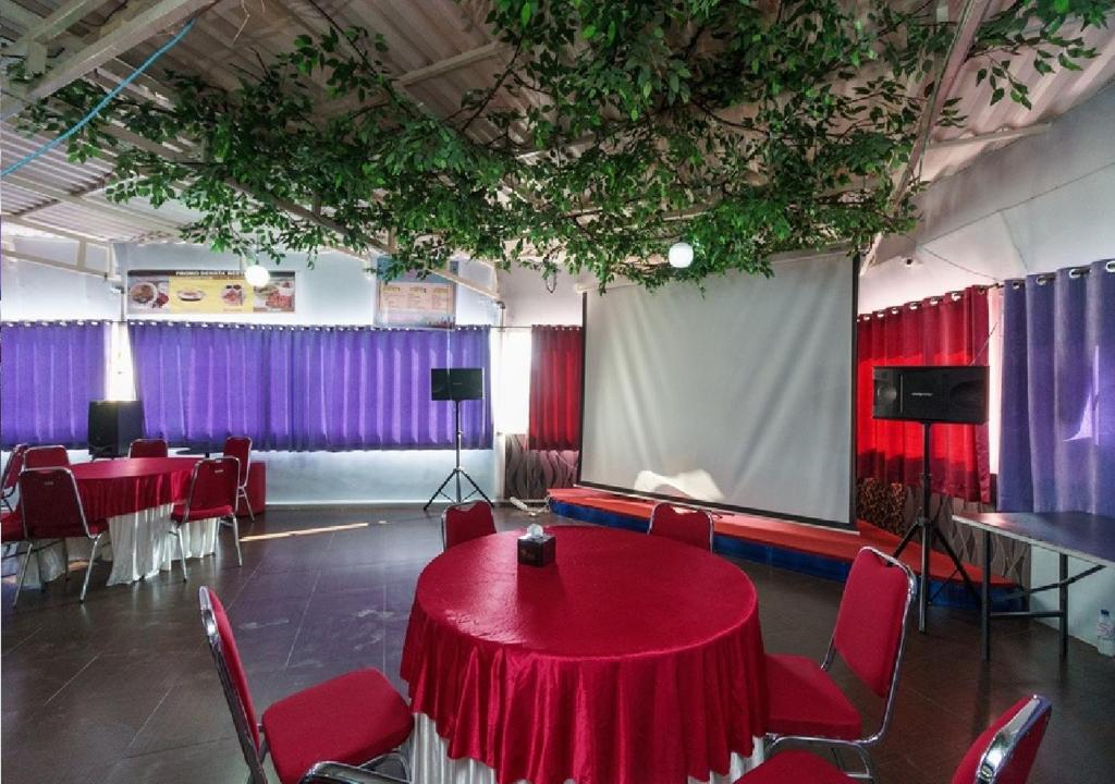 TV a/nebo společenská místnost v ubytování Hotel Domino