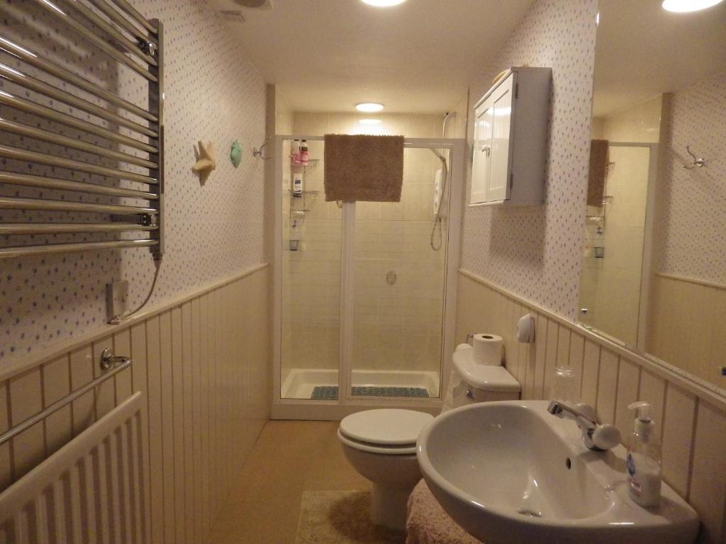 Koupelna v ubytování Sorbietrees B&B