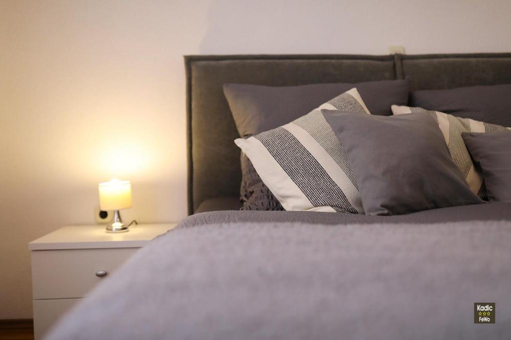 Posteľ alebo postele v izbe v ubytovaní Carmen Apartment Deluxe