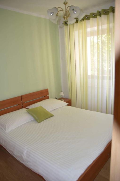 Postel nebo postele na pokoji v ubytování Apartments Klabjan