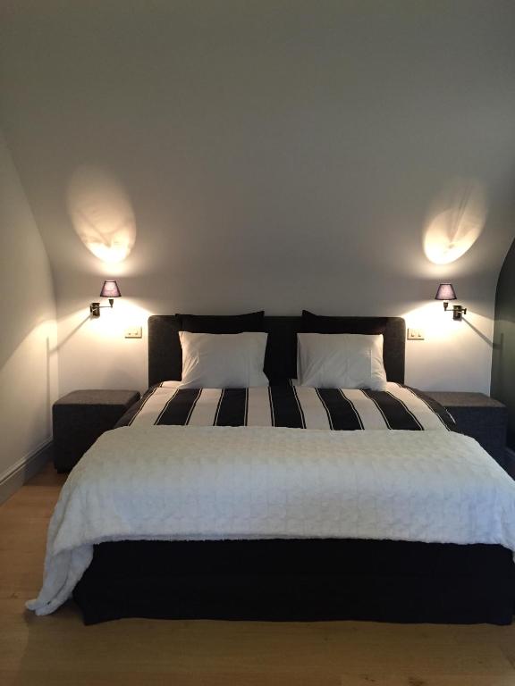 Postel nebo postele na pokoji v ubytování Guesthouse Villa Vauban