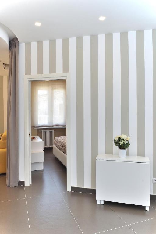 Łóżko lub łóżka w pokoju w obiekcie Costa d'Amalfi Apartments