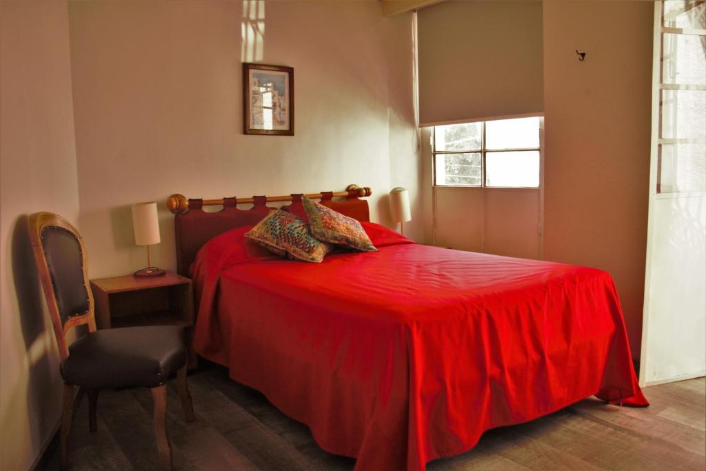 Postel nebo postele na pokoji v ubytování Hotel lit Guadalajara