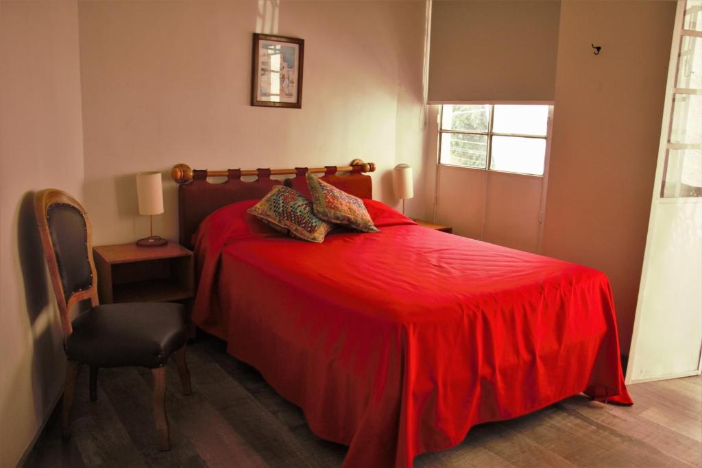 Postel nebo postele na pokoji v ubytování Hotel lit Guadalajara
