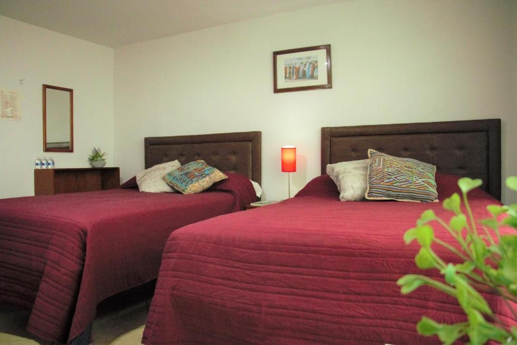 Postel nebo postele na pokoji v ubytování Hotel lit Guadalajara