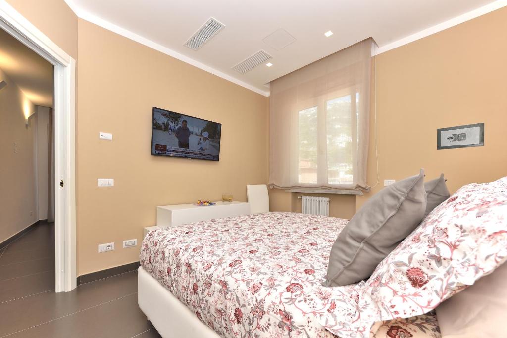 Łóżko lub łóżka w pokoju w obiekcie Costa d'Amalfi Apartments