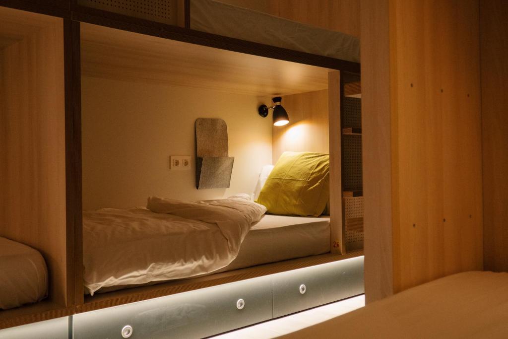 Postel nebo postele na pokoji v ubytování Blai Blai Hostel