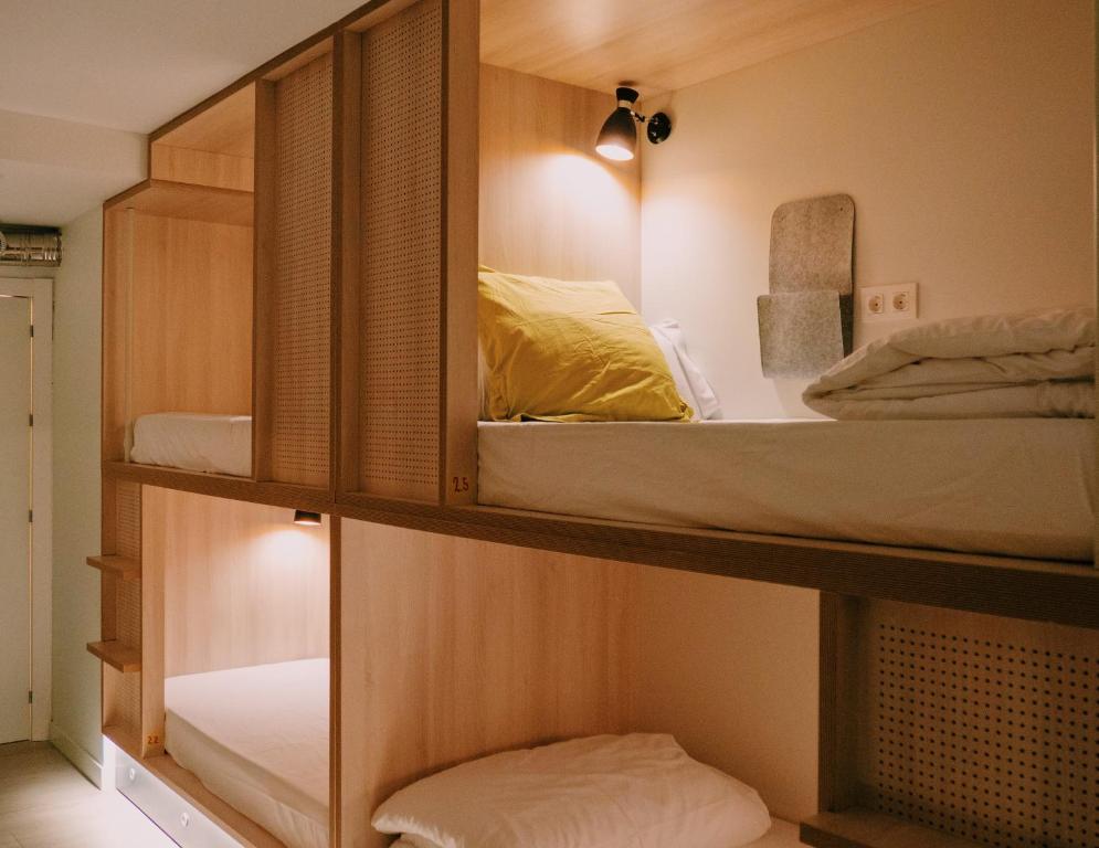 Postel nebo postele na pokoji v ubytování Blai Blai Hostel