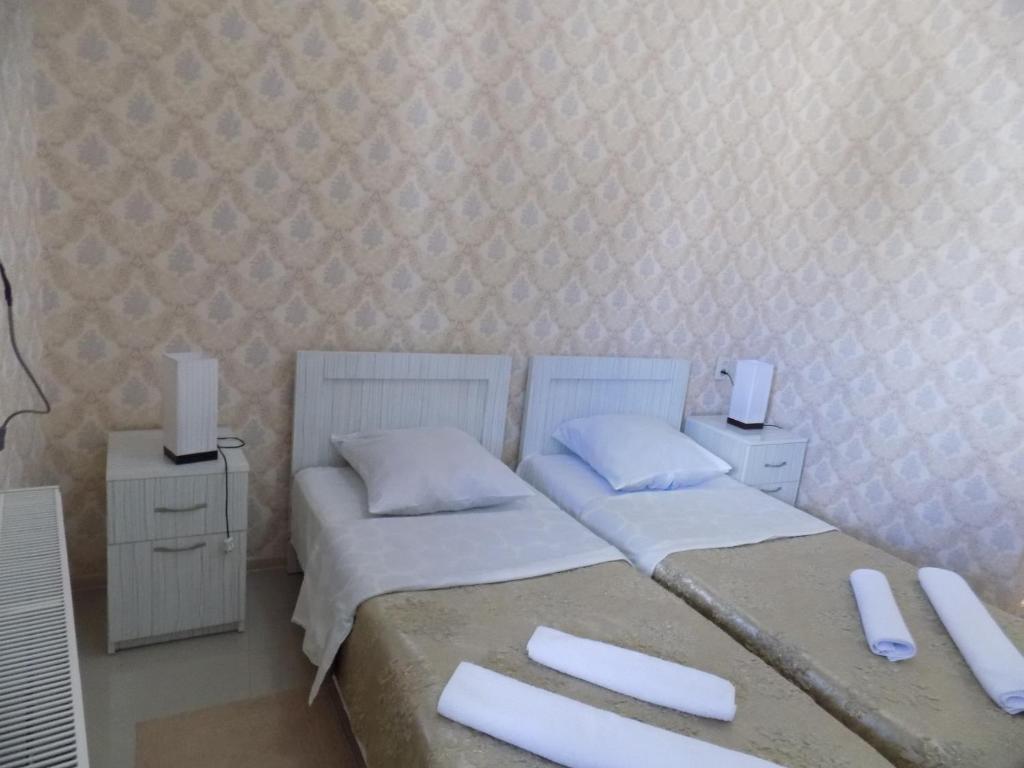 Postel nebo postele na pokoji v ubytování Hotel New Star