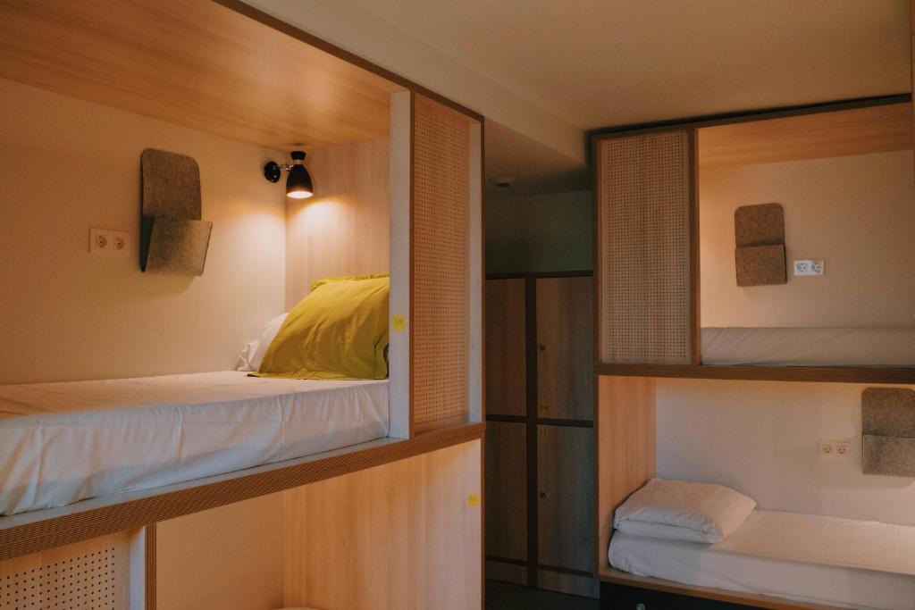 Postel nebo postele na pokoji v ubytování Blai Blai Hostel