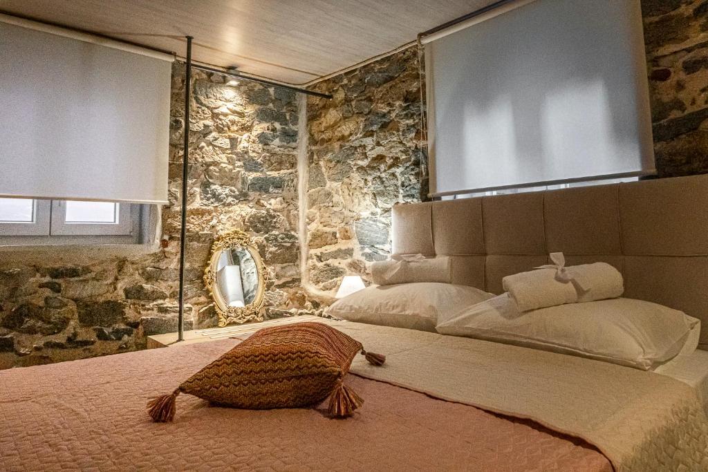 Posteľ alebo postele v izbe v ubytovaní PETRA'S HOUSE