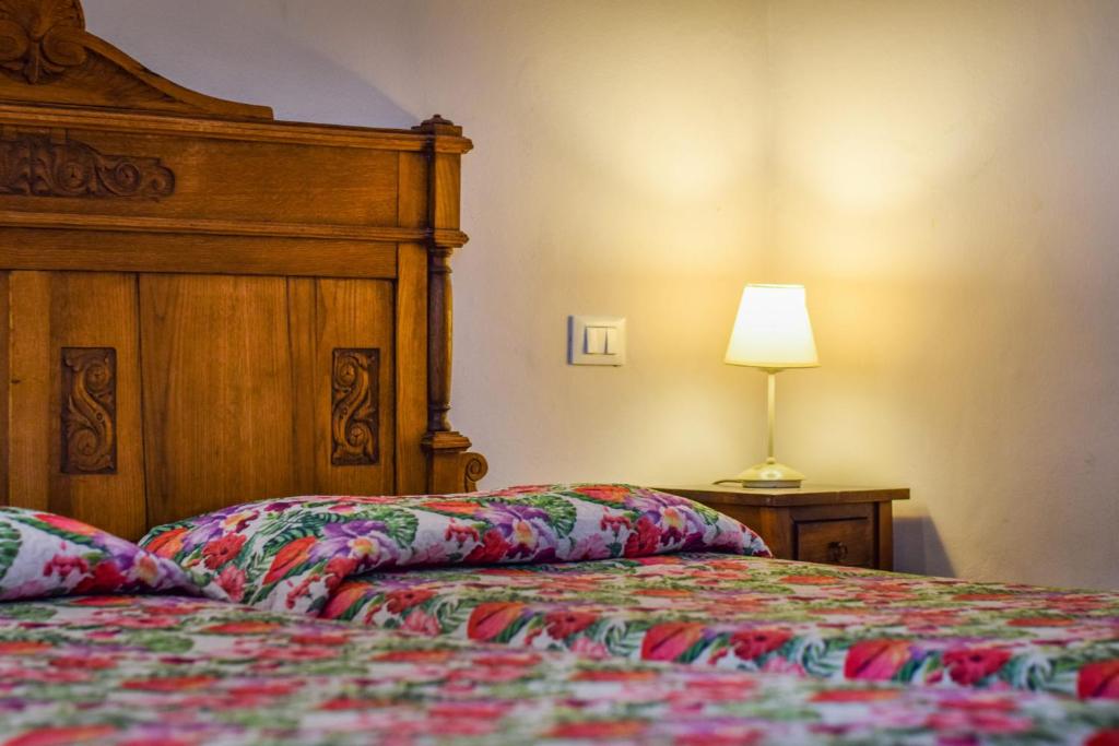 A bed or beds in a room at Hotel Medici