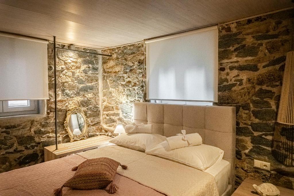 Posteľ alebo postele v izbe v ubytovaní PETRA'S HOUSE