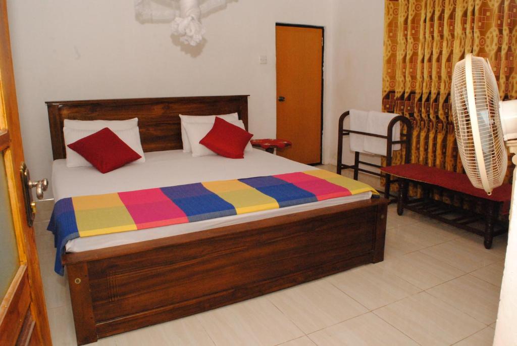 Cama o camas de una habitación en Kandy Shady Trees Villa