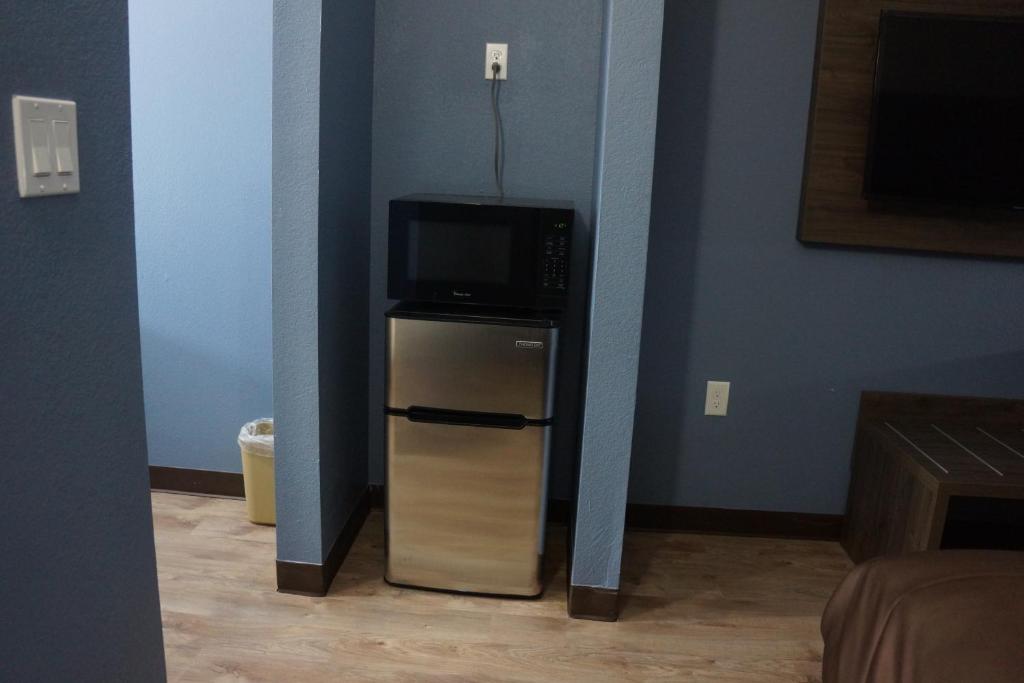 TV a/nebo společenská místnost v ubytování Texan Hotel