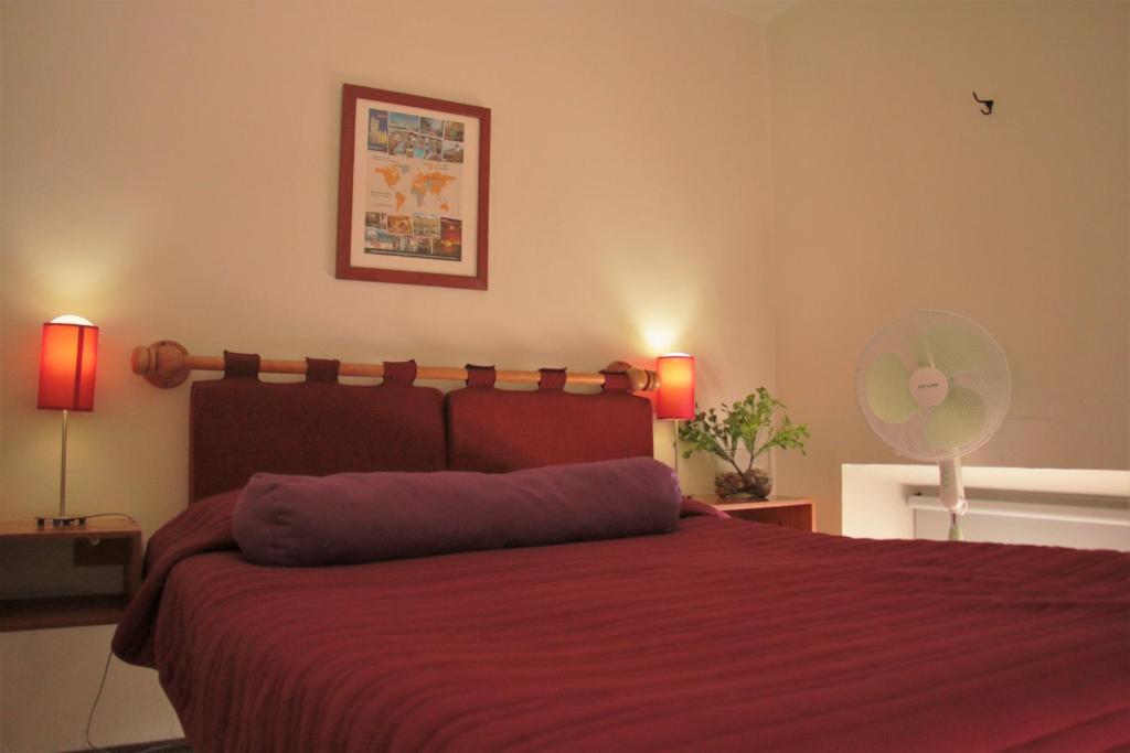 Postel nebo postele na pokoji v ubytování Hotel lit Guadalajara