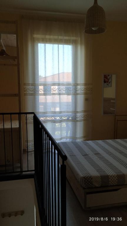Postel nebo postele na pokoji v ubytování Bella Civita