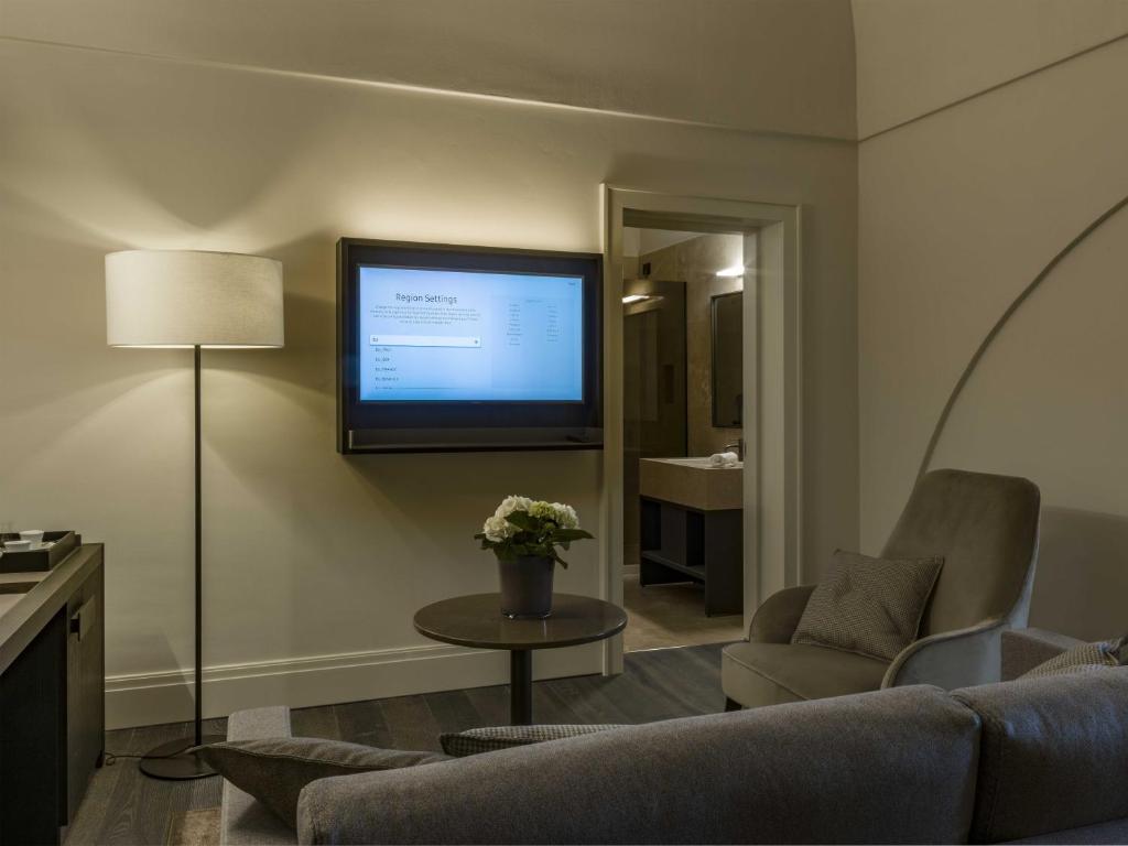 TV a/nebo společenská místnost v ubytování DOGANA RESORT