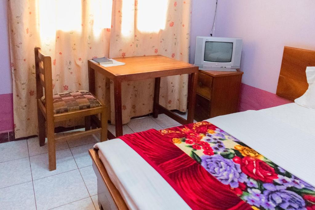 TV a/nebo společenská místnost v ubytování Starlight Hotel Mbale