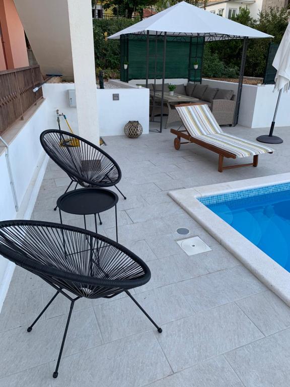 Bazén v ubytování Apartments Villa Bella Vista Seget nebo v jeho okolí