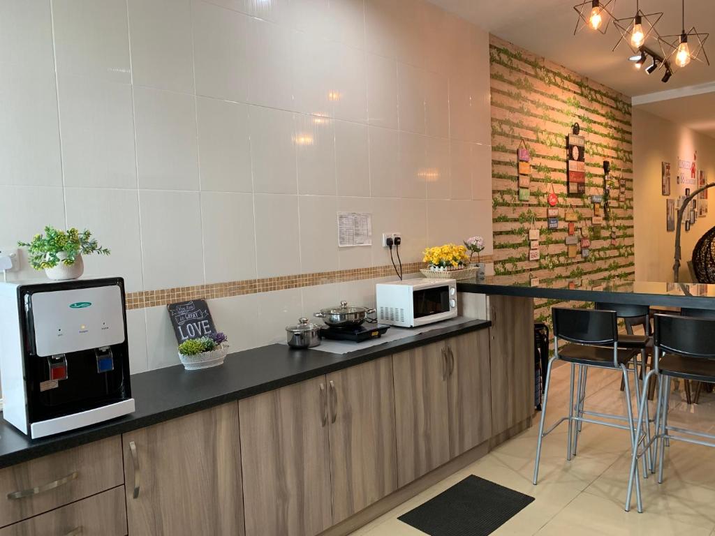 Kuchyň nebo kuchyňský kout v ubytování Jonker 88 Homestay Melaka
