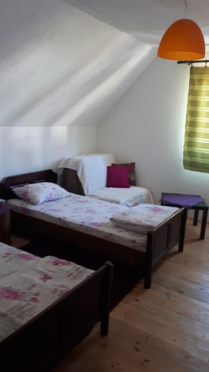 Postel nebo postele na pokoji v ubytování Golubović Apartments