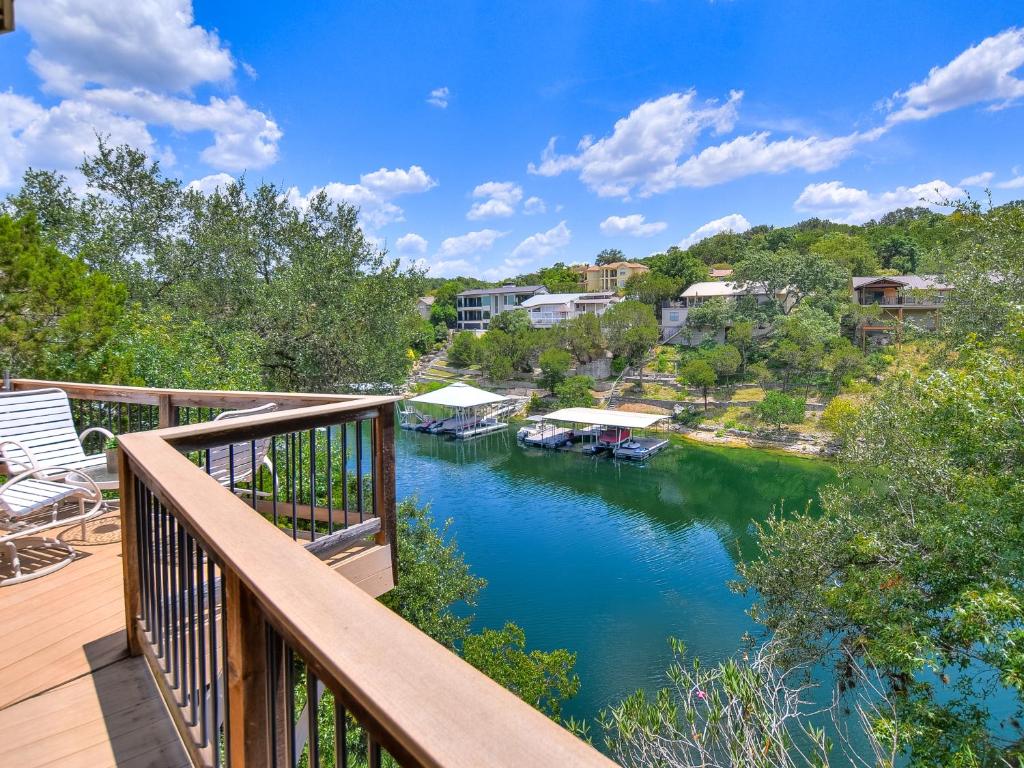 a view of a river from a deck at The Treehouse On Lake Travis in Lakeway