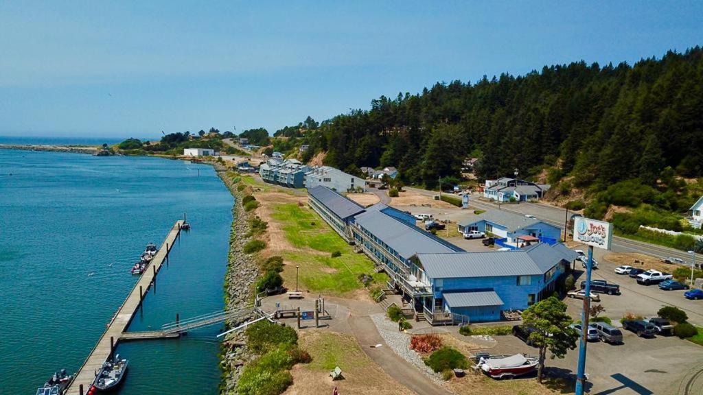 an aerial view of a marina next to the water at Jot's Resort in Gold Beach