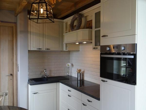 Kuchyň nebo kuchyňský kout v ubytování B&B Hoeve Ransberg