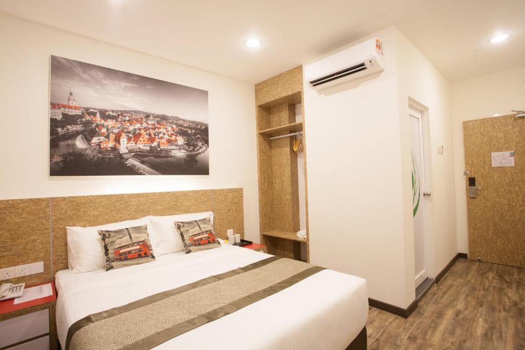 Postel nebo postele na pokoji v ubytování Natura Hotel