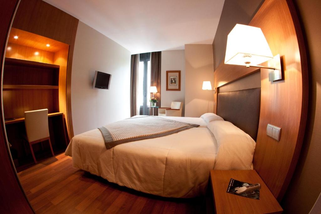 Postel nebo postele na pokoji v ubytování Alti Hôtel
