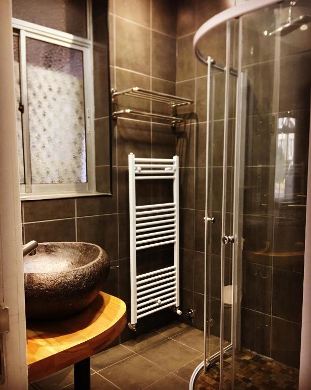 Koupelna v ubytování Hostal Boutique Puerta Roja