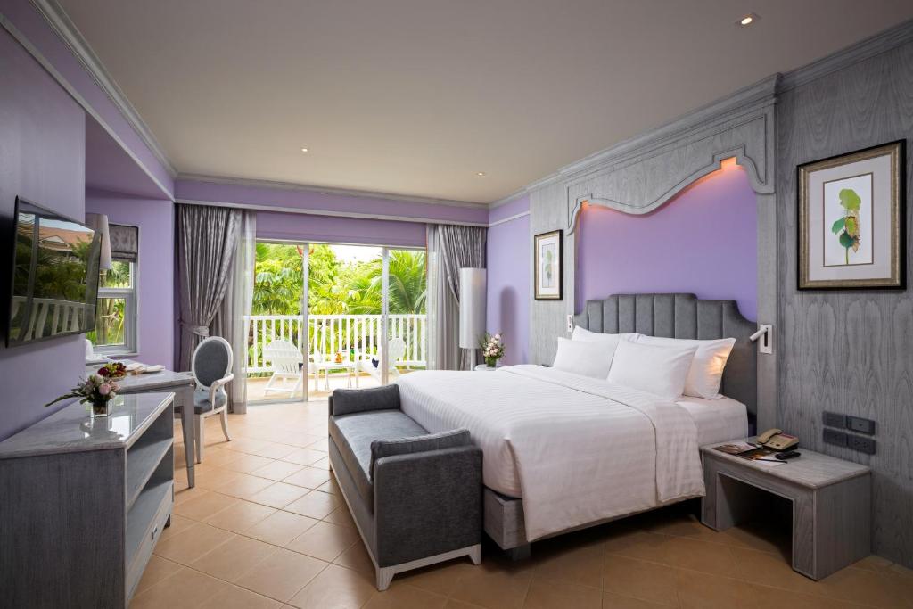 Кровать или кровати в номере Aonang Villa Resort I Beach Front