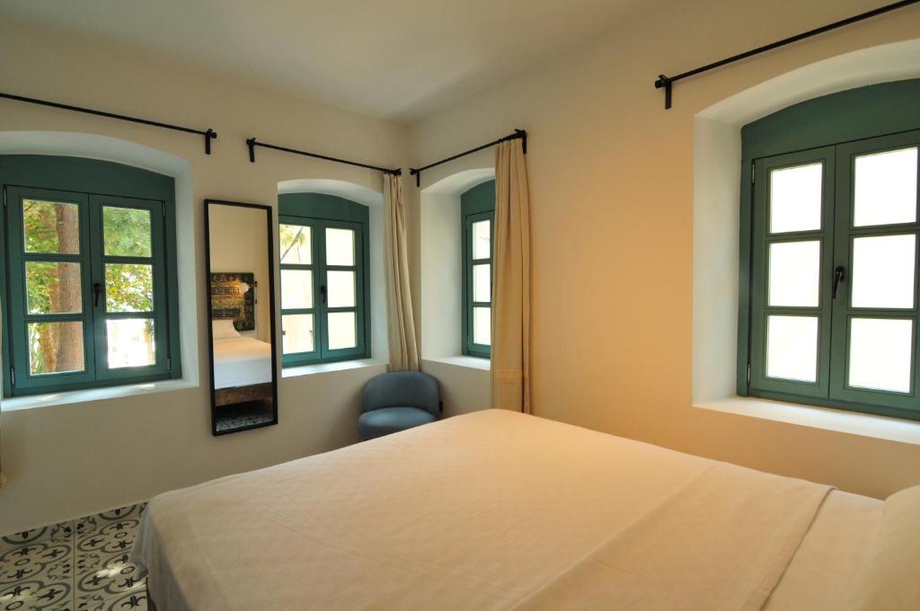 Postel nebo postele na pokoji v ubytování Oalis Boutique Hotel