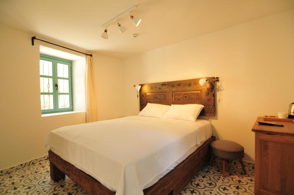 Postel nebo postele na pokoji v ubytování Oalis Boutique Hotel